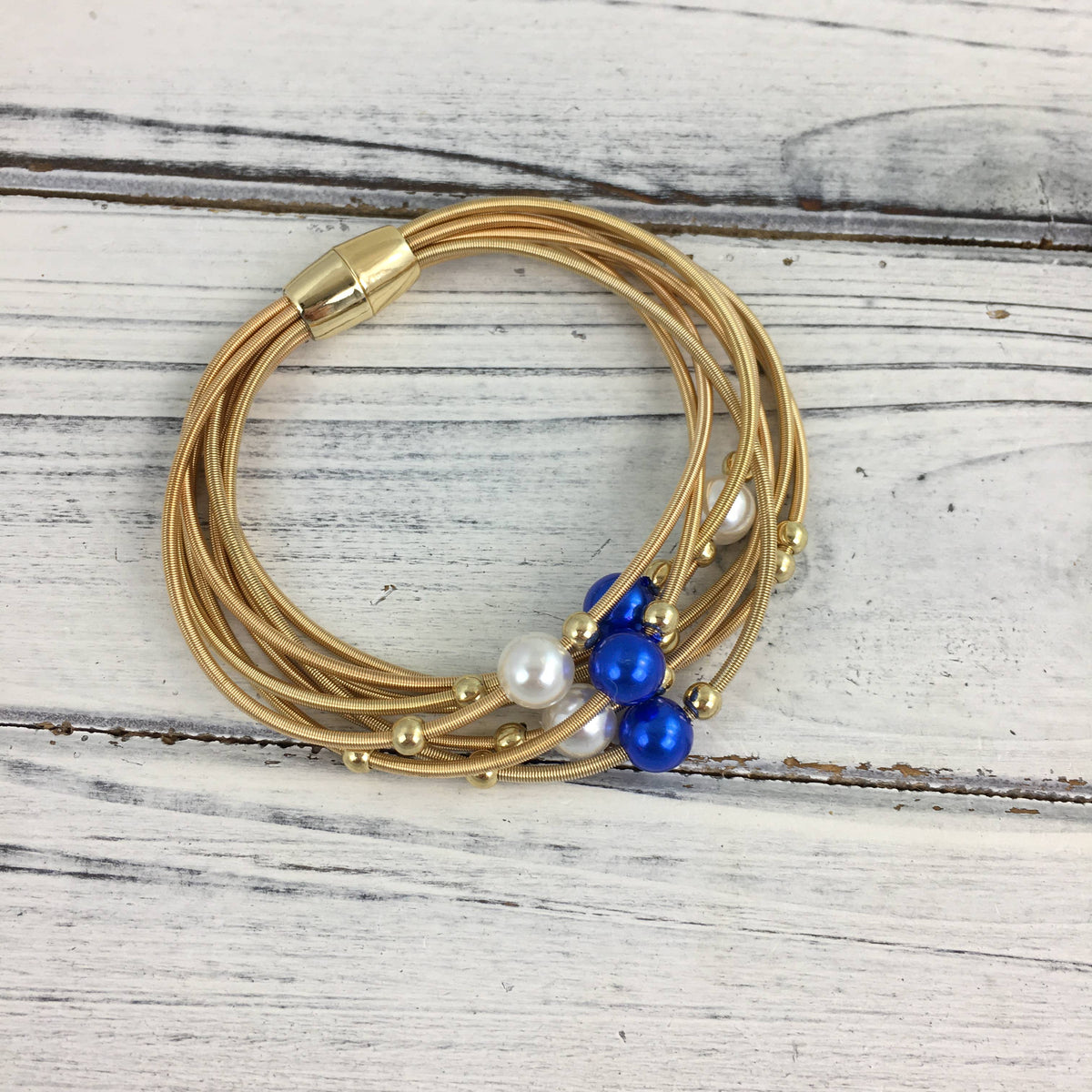 Blue and white pearl guitar string bracelet  