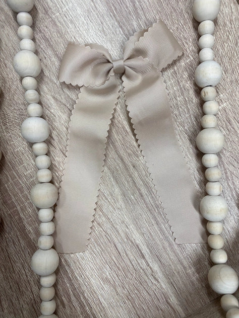 Scalloped Long Tail Bow